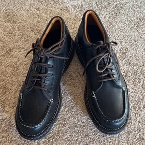 Men’s brand new black leather lace up shoes.